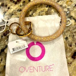 Oventure key ring in gold confetti Brand New